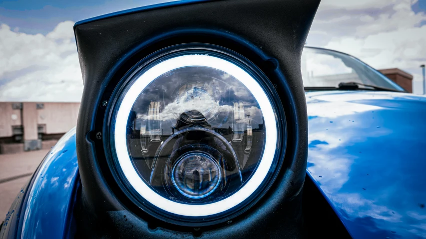 this is the headlight on a blue car