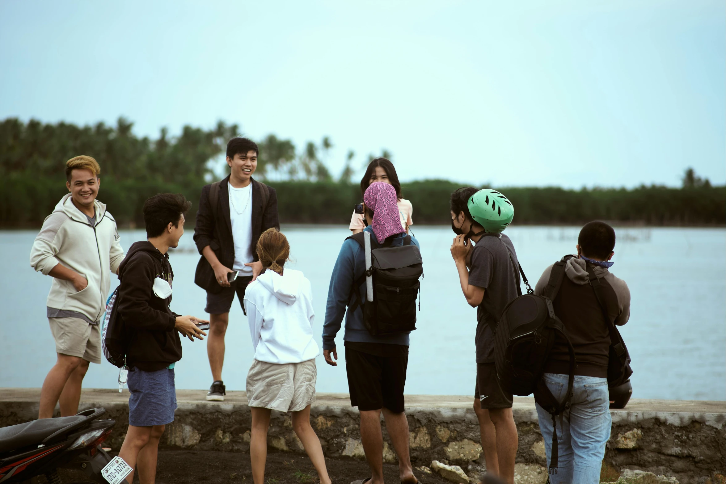 a group of people standing next to each other