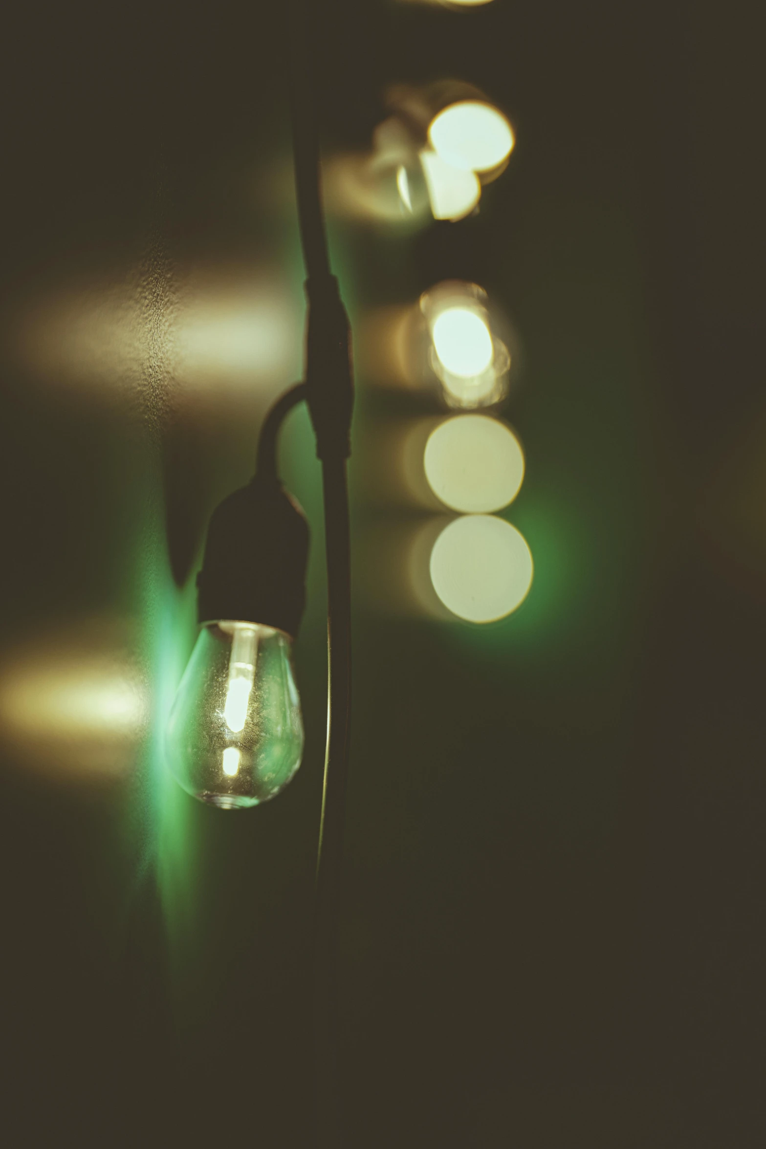 an old fashioned light bulb and some other lights