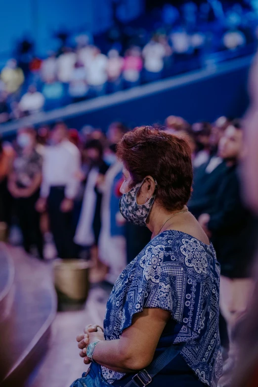 the crowd is waiting in the stadium to see the show