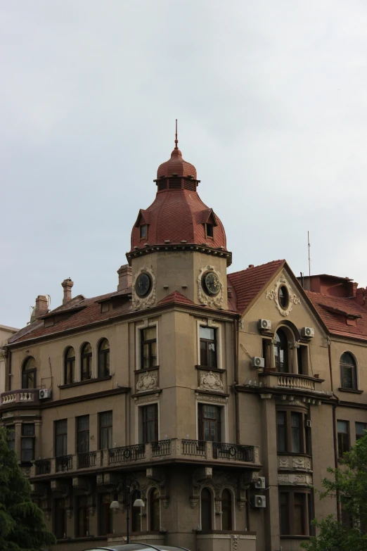 an old building with clocks on top