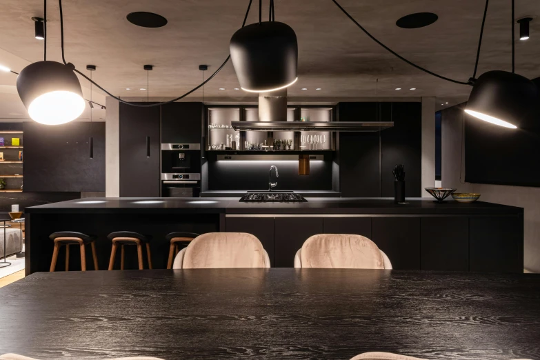 modern kitchen with an island and bar stools