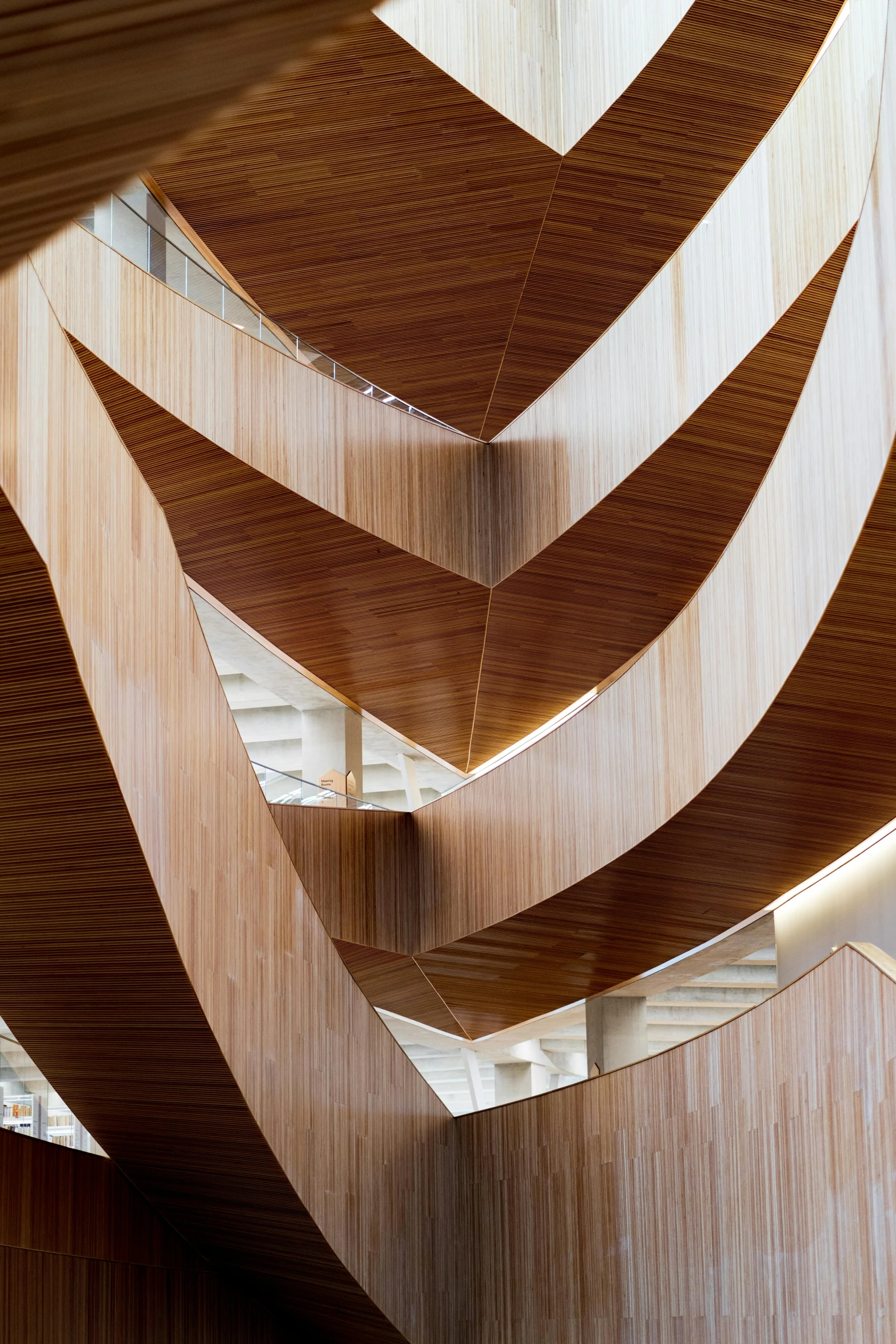 wooden ceilings in a wooden building with multiple panels hanging from the ceiling