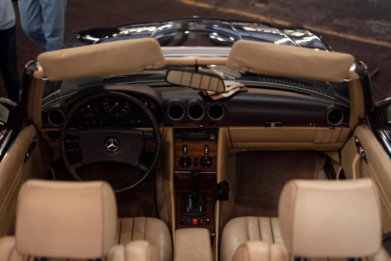 an interior s of a car, showing the dashboard and passenger seats