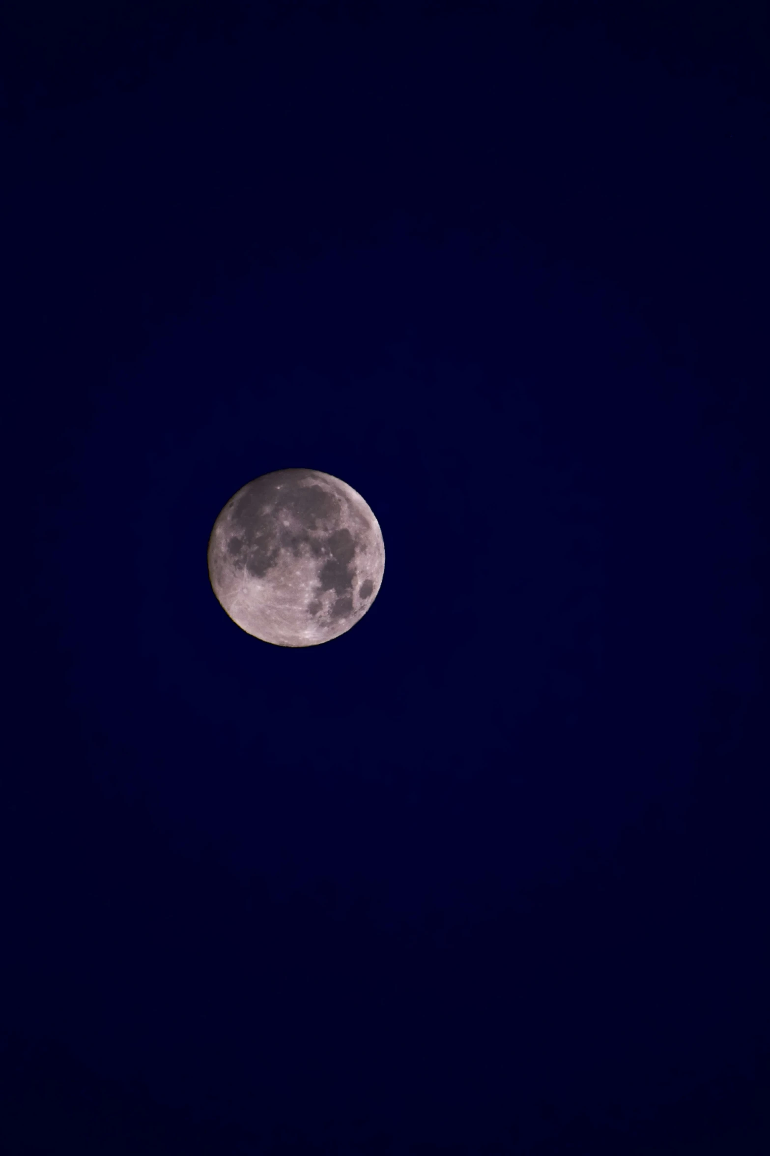 a view of the moon seen from an airplane