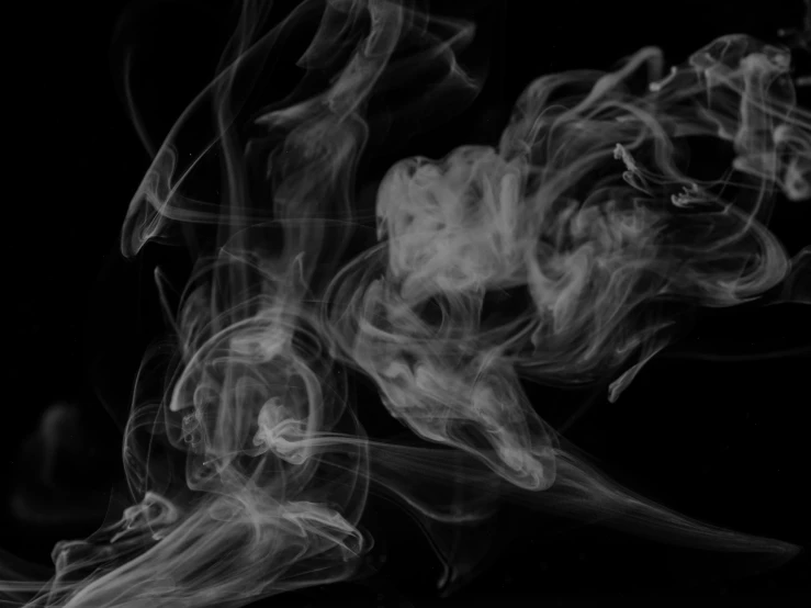 smoke in the air with black background