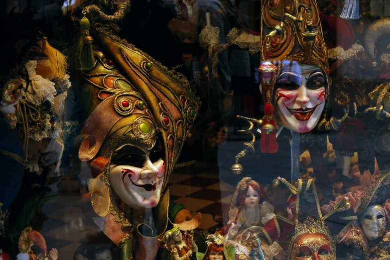 several different masks in the shop front window