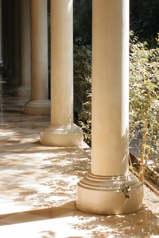 an ornately trimmed porch with white columns