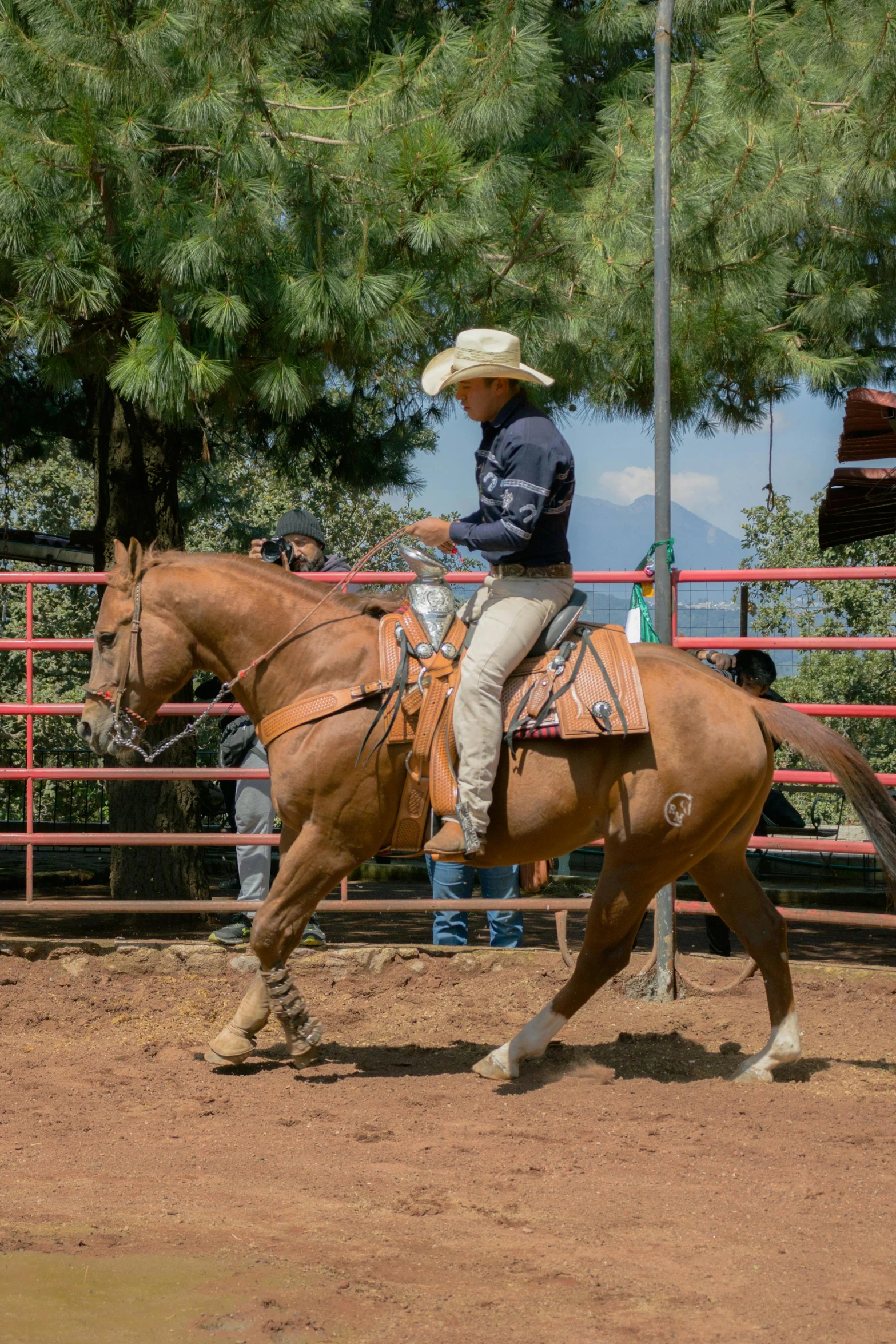 a man that is sitting on a horse