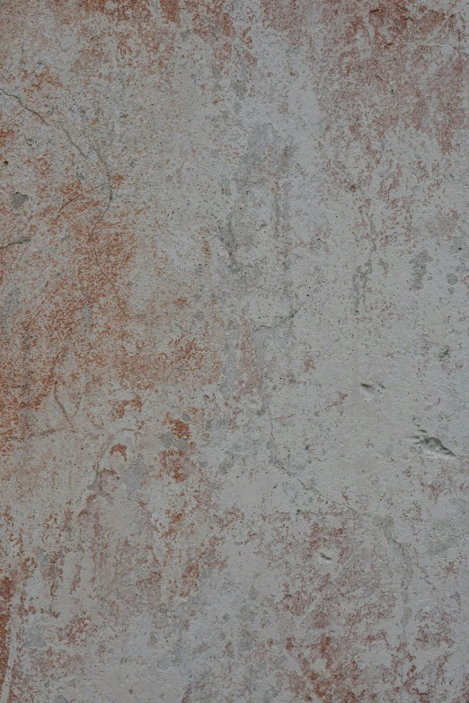 a stone background with brown spots and speckles