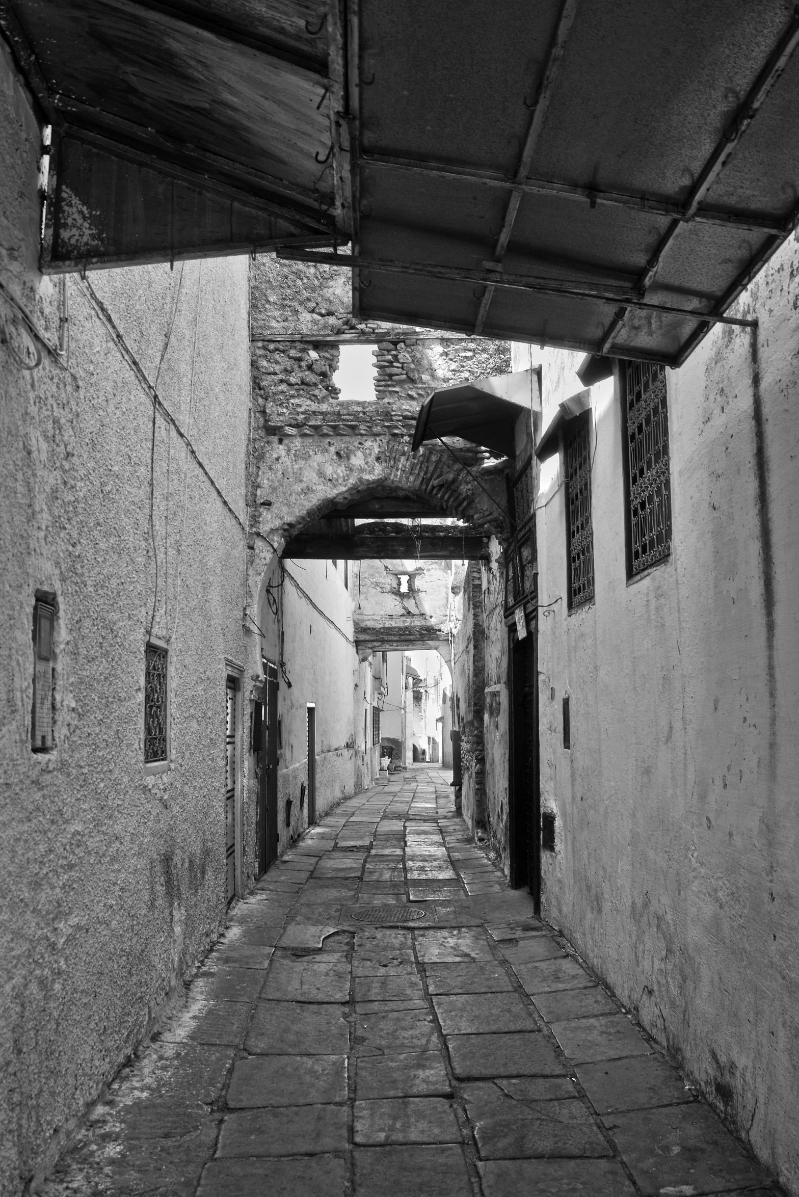 a dark alley in an old, old town