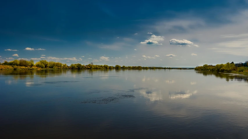 the view is of a lake and sky