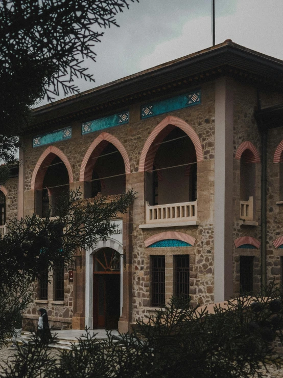 an image of a building with some plants around it