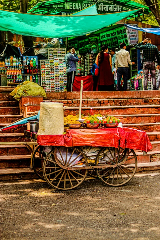 an open air market with several items on display