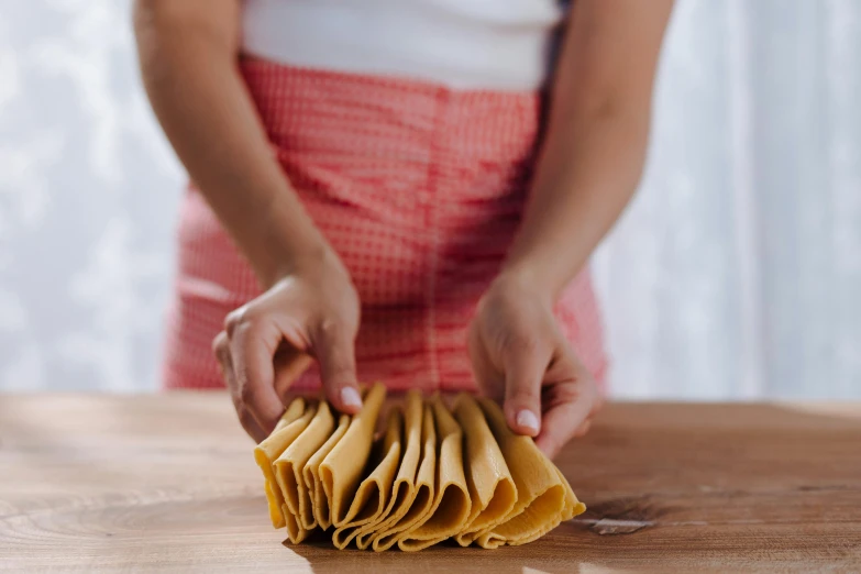 a woman is doing a  process on an open  board