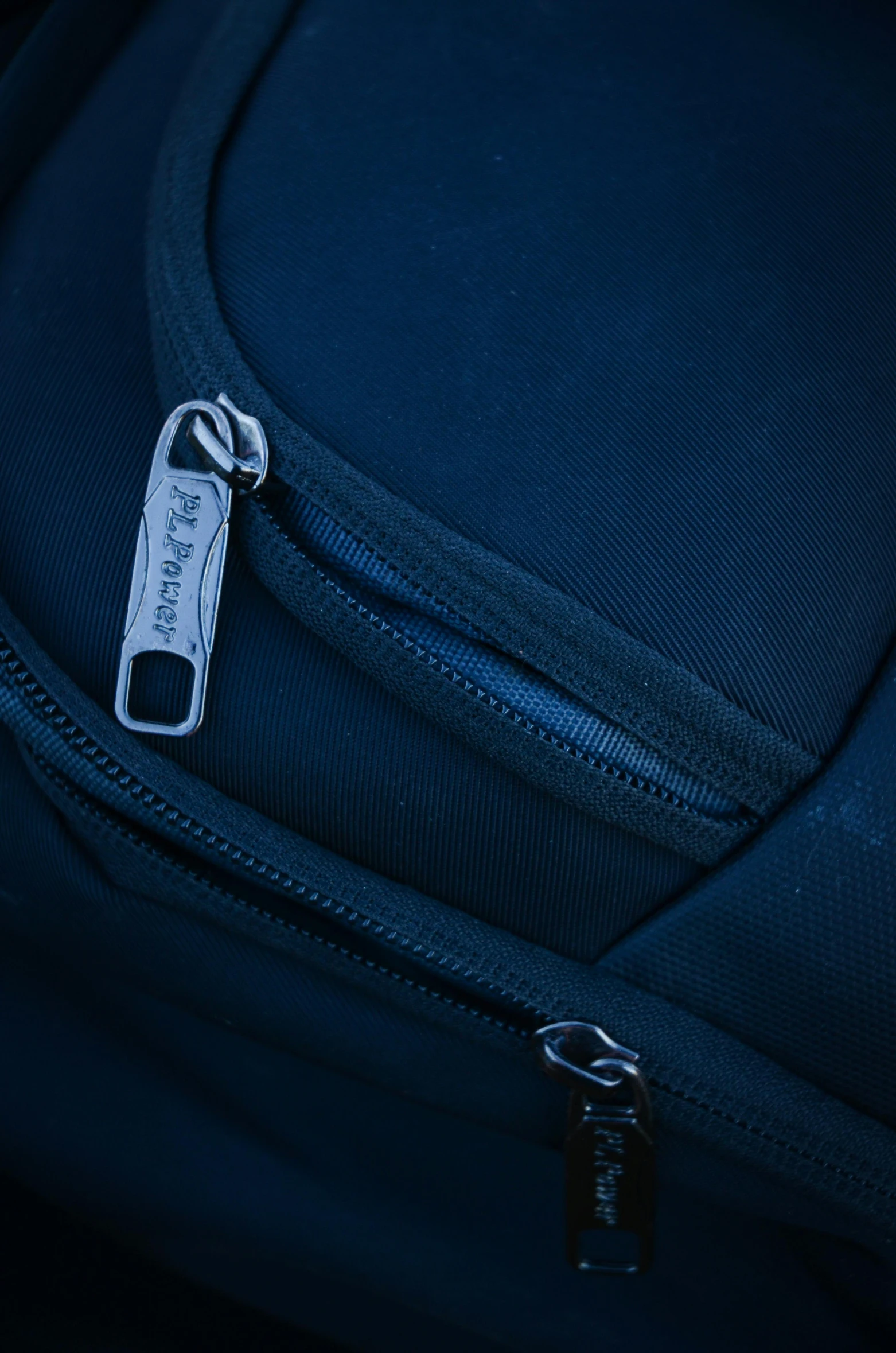 an open backpack with the tag showing on it