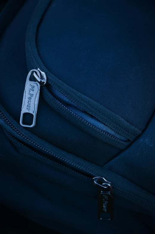 an open backpack with the tag showing on it