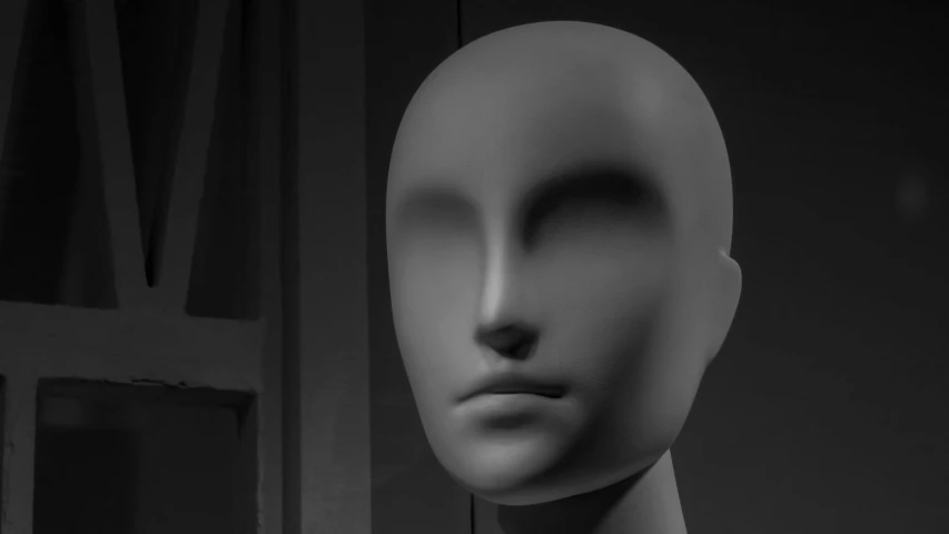 an empty mannequin head and half a closed door