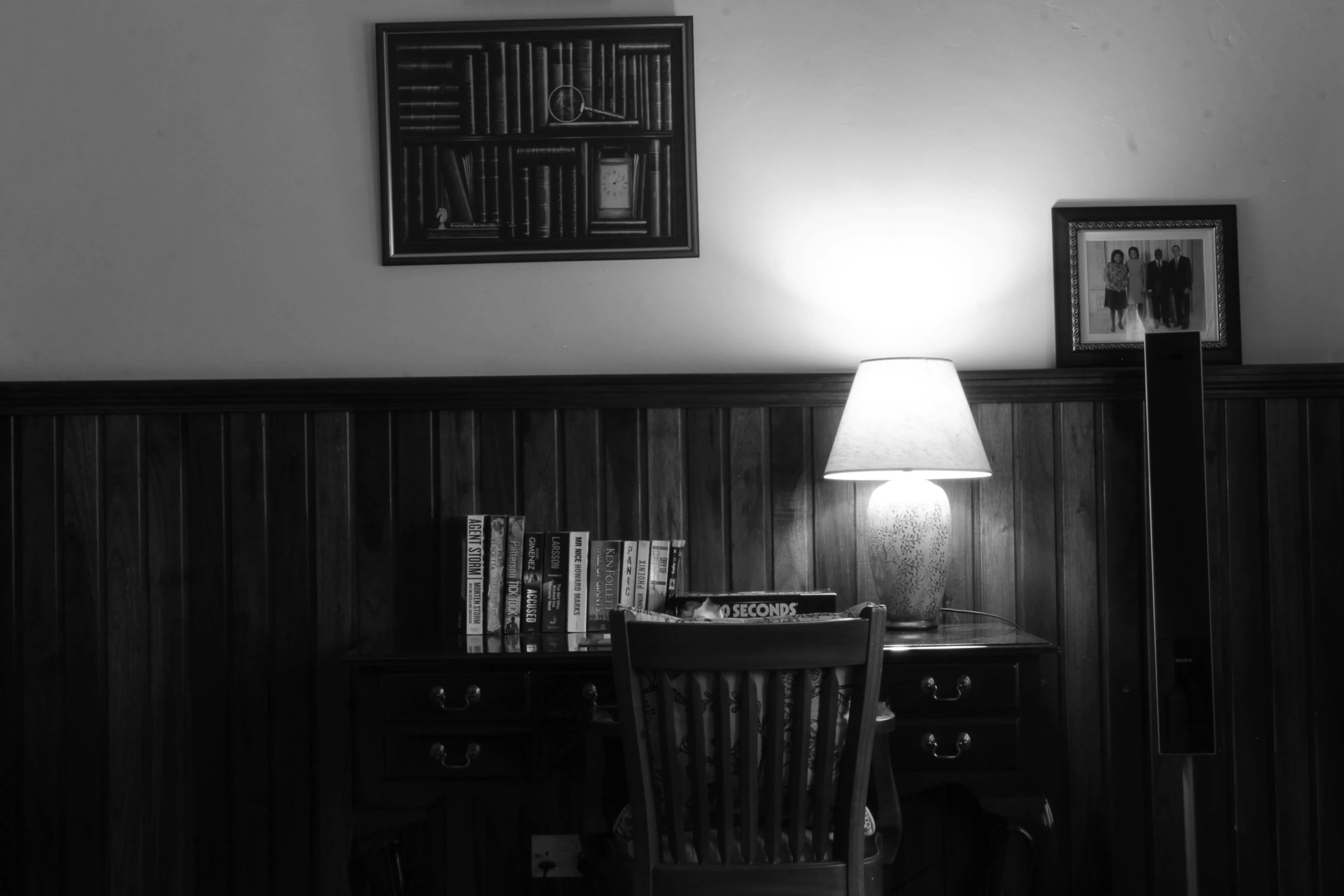 a black and white po of a chair and table