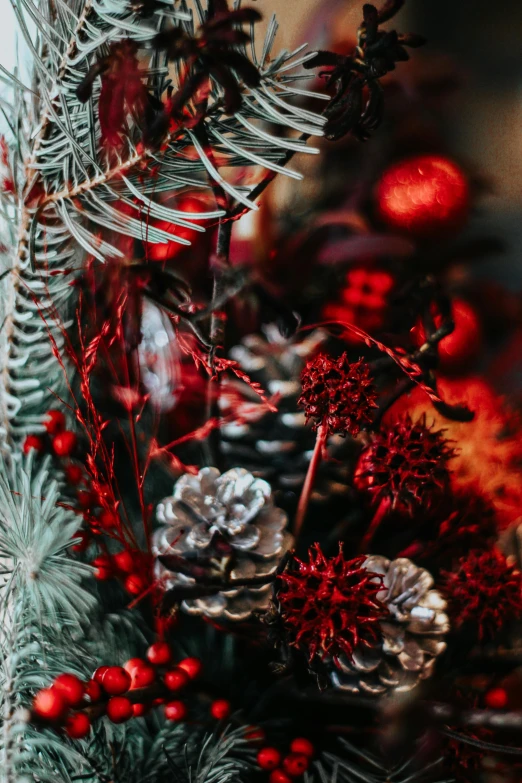 red and silver decorations are featured on the table