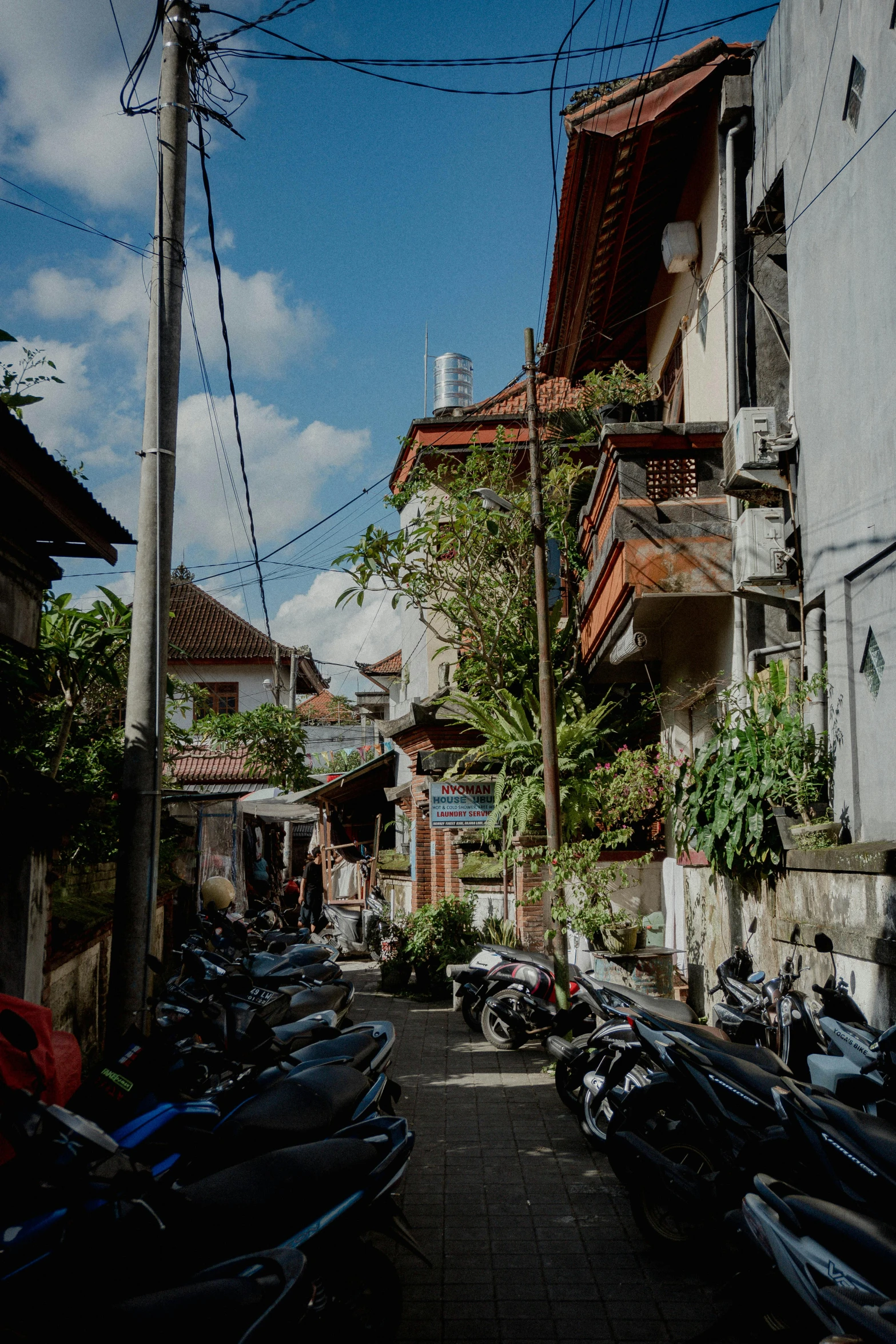 the street with all sorts of motorcycles are empty