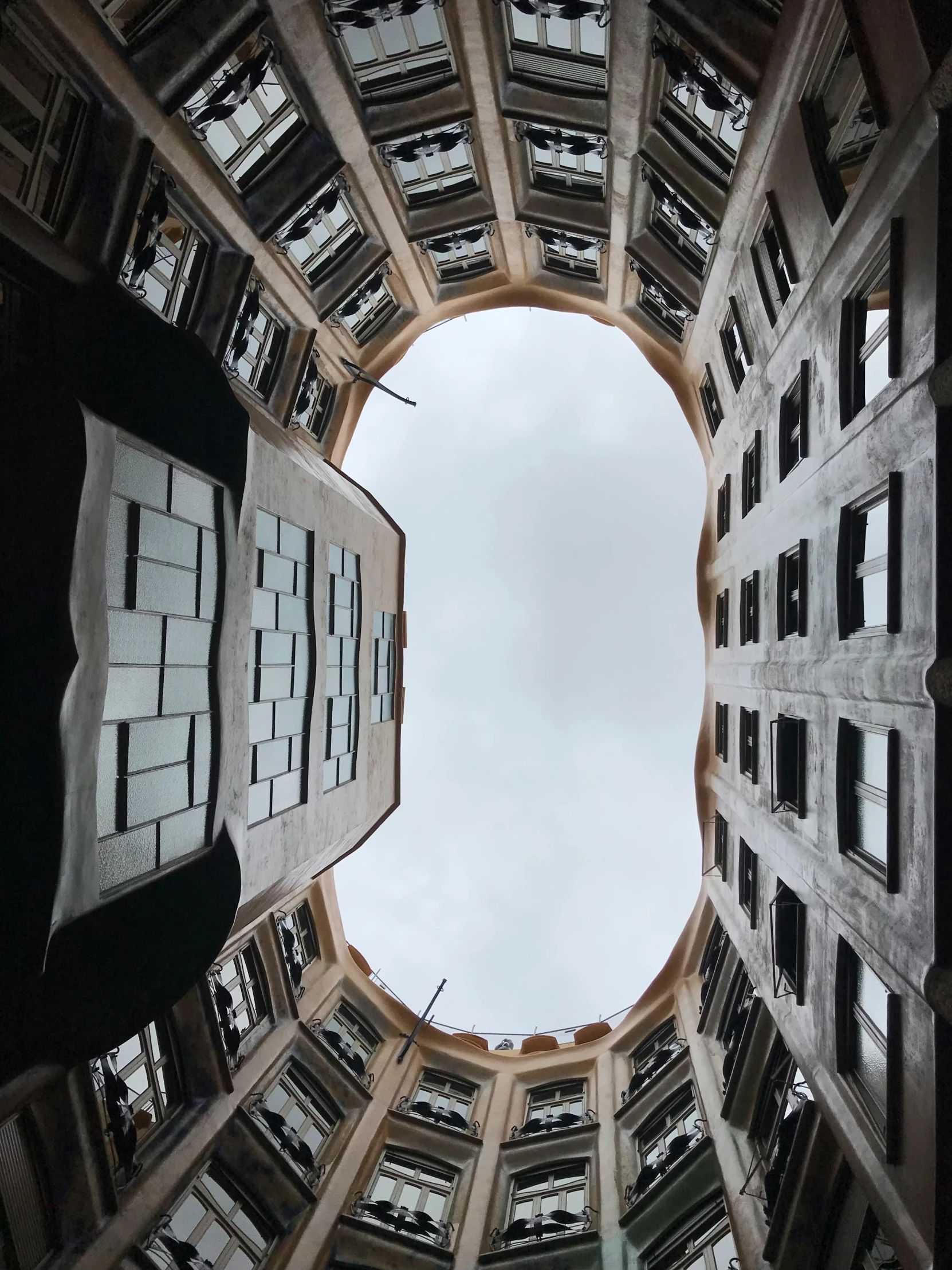 looking up at multiple windows on the outside