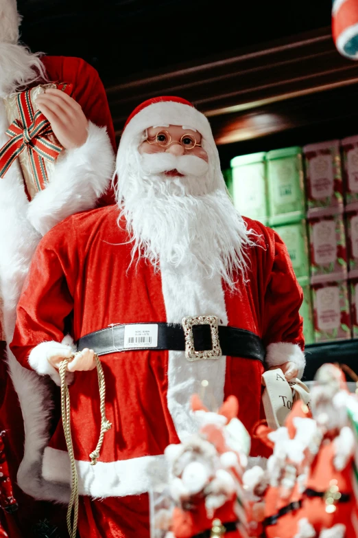 santa claus in his room with bags of presents