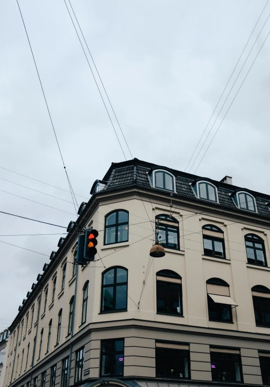 an image of a building on the corner of a street