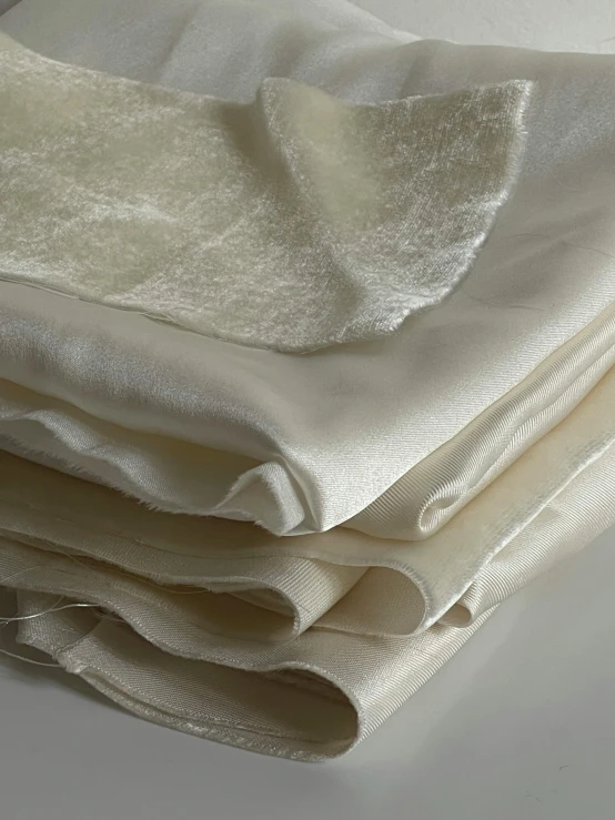 a stack of cloth with no labels on it