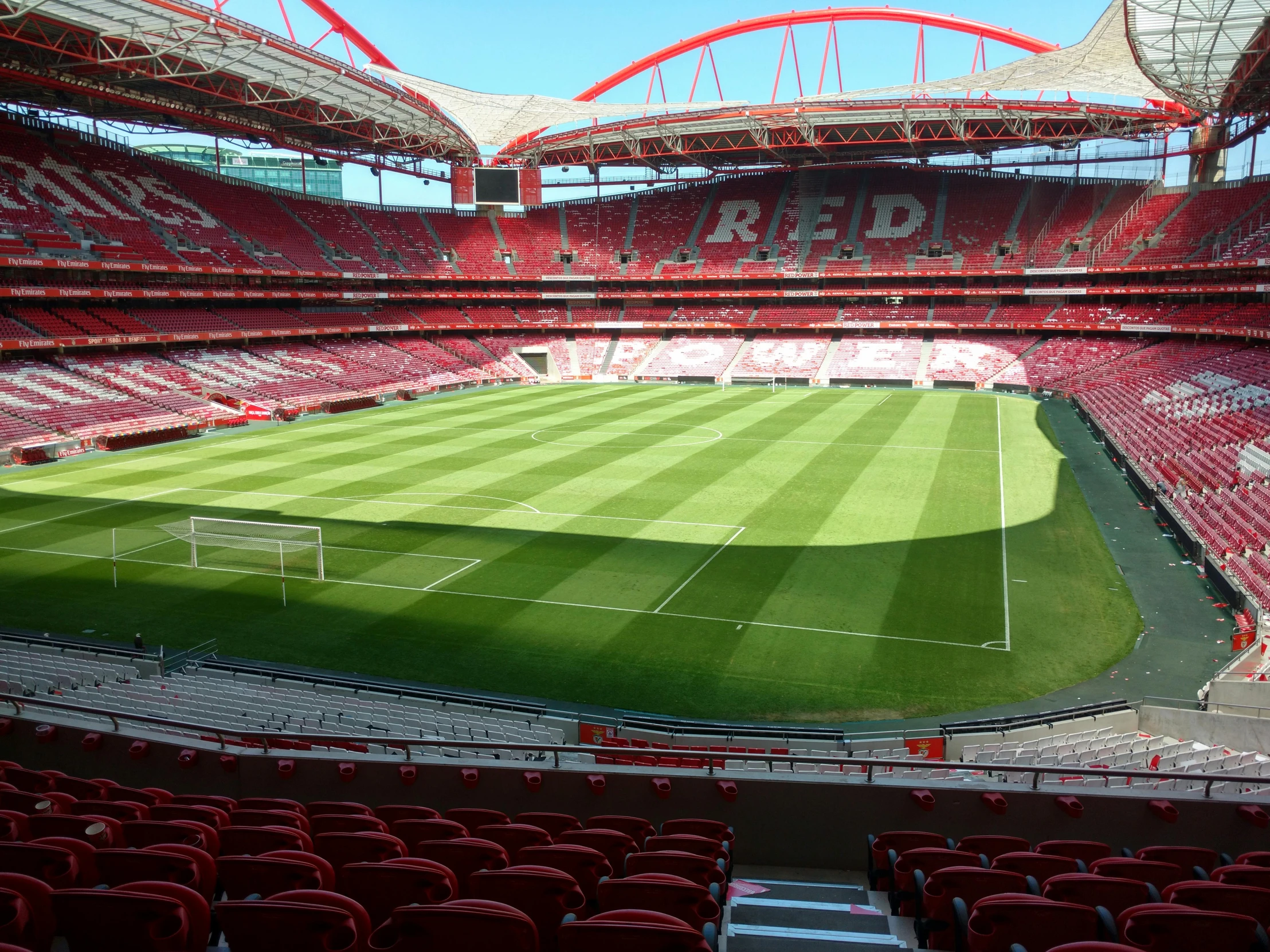 a po taken inside of an empty red stadium