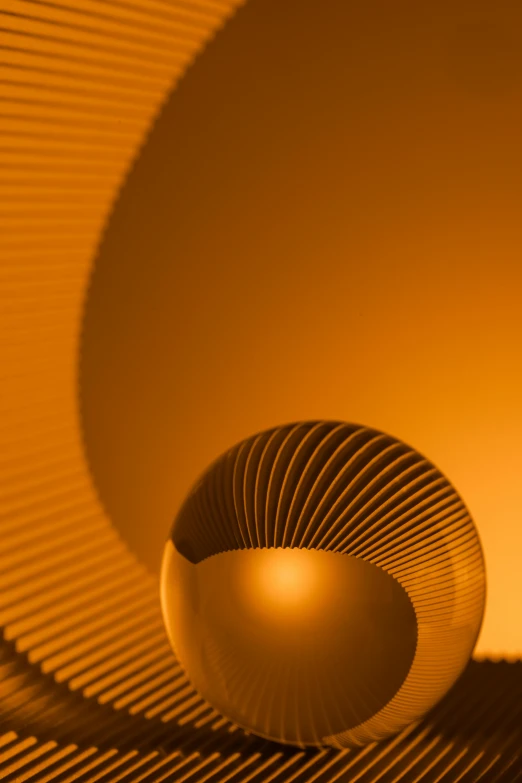 a dim light sphere suspended from the ceiling