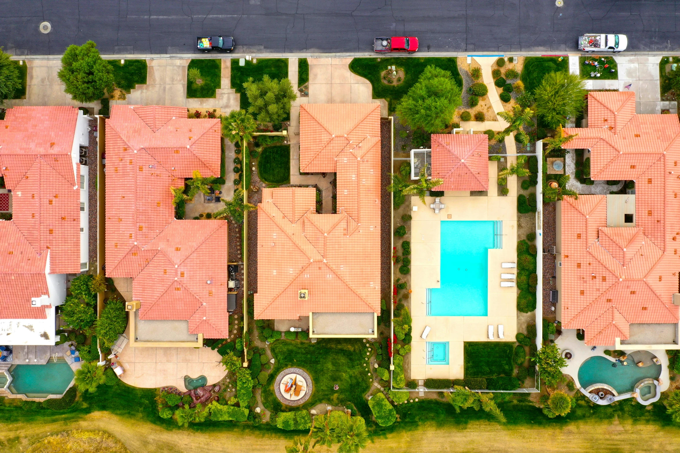 a po of a large residential community with a swimming pool