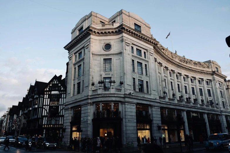 a large building with a street light on the corner