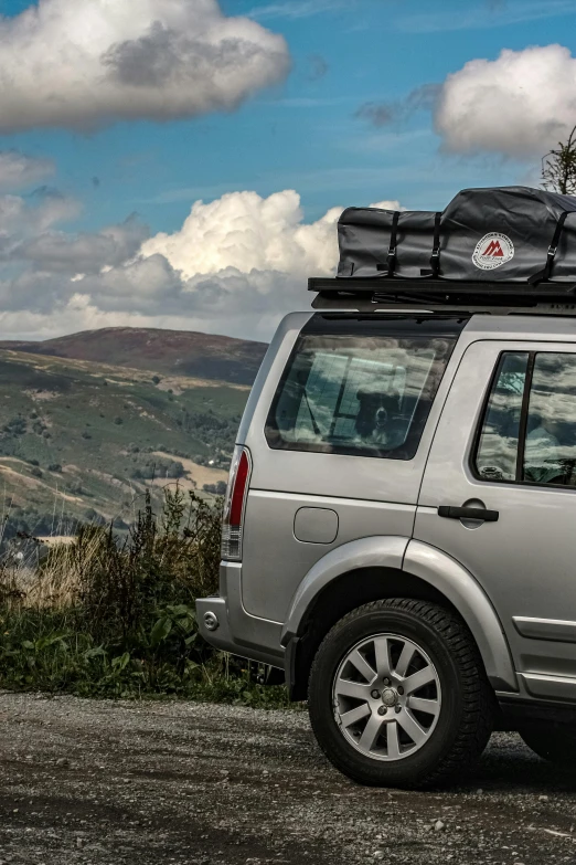 a car that has some luggage on top