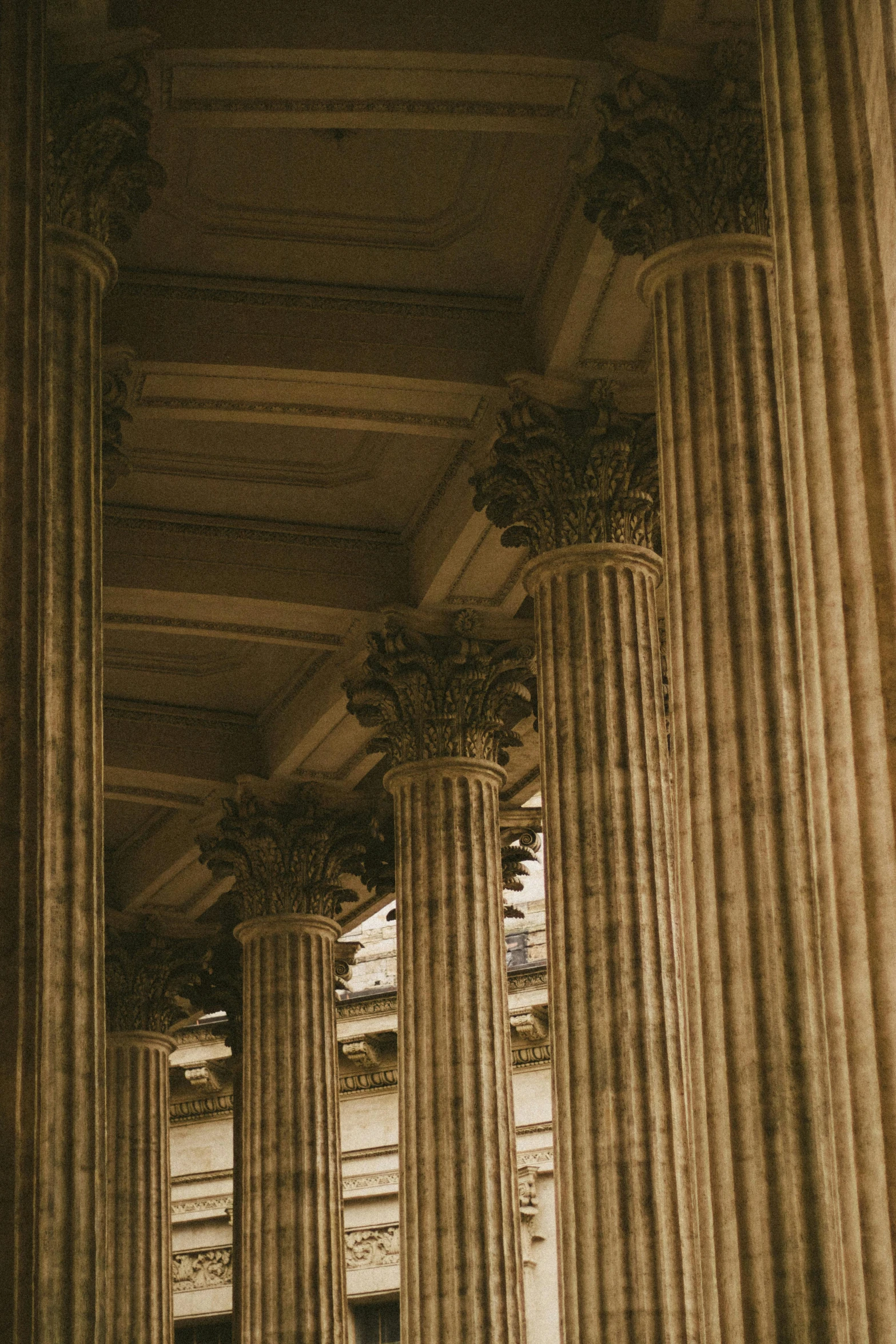 a series of large pillars on a building