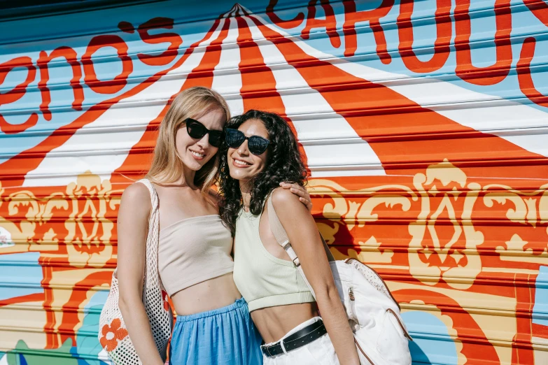 two women in front of a sign that says circus