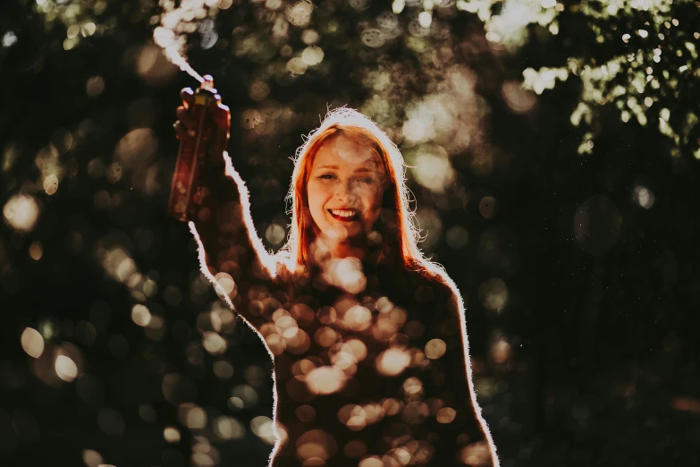 a lady is holding her sun umbrella in her hand