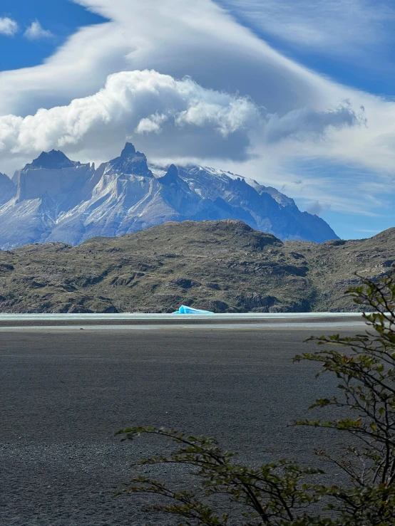 the blue piece of plastic is floating in the lake