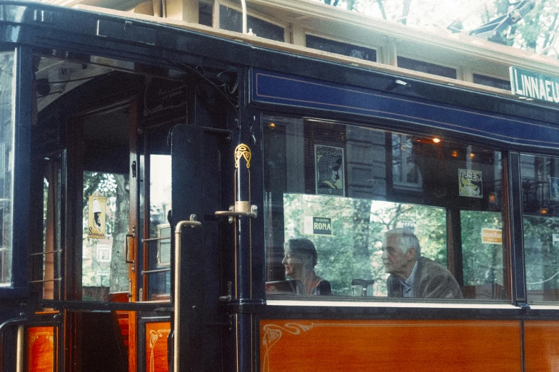 people sit inside a city bus with no driver