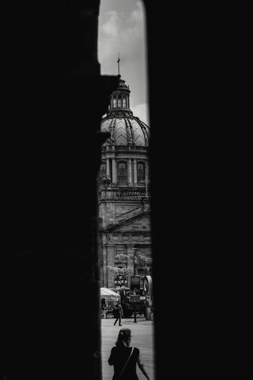 the top of a building seen through a door