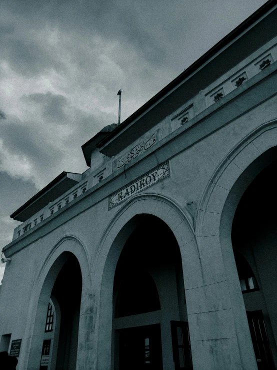 a building on a cloudy day in the dark