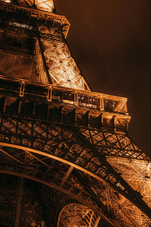 the view of the top part of the eiffel tower in paris