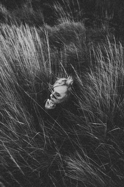 a scary mask in a grassy field