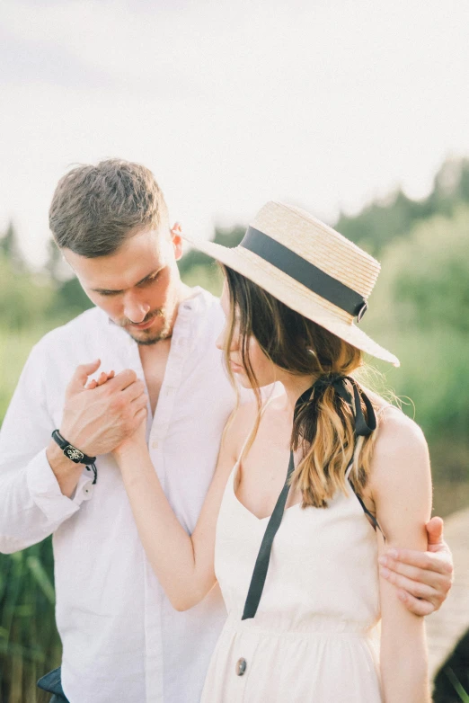 the young couple are posing for a po