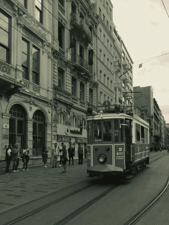 a streetcar in the middle of a city street