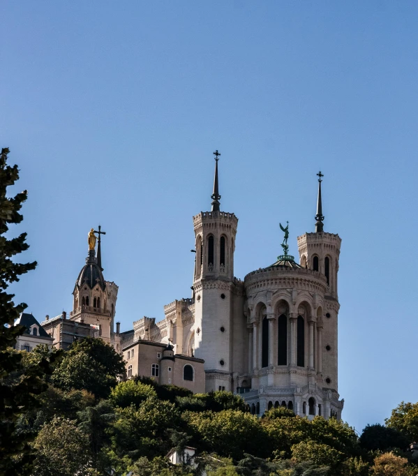 the top half of a building with a clock tower on it