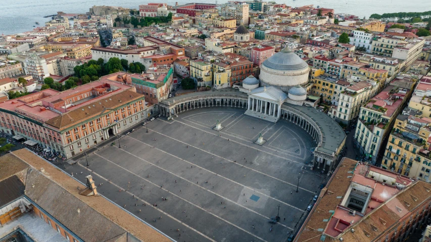 a city in italy with buildings and a church tower