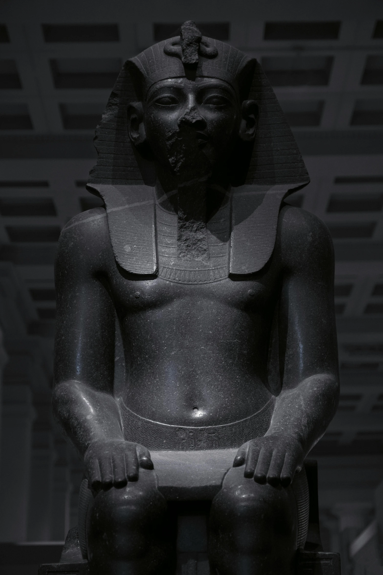 an image of an egyptian sculpture on display