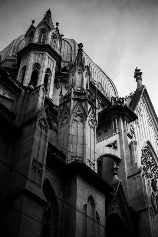 the outside of an old building with two towers