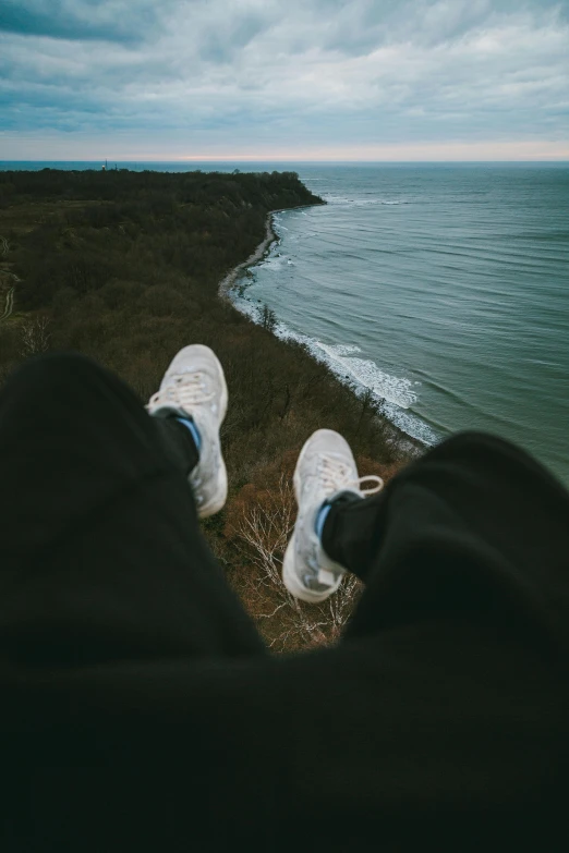 a view looking down on someone with their feet propped up